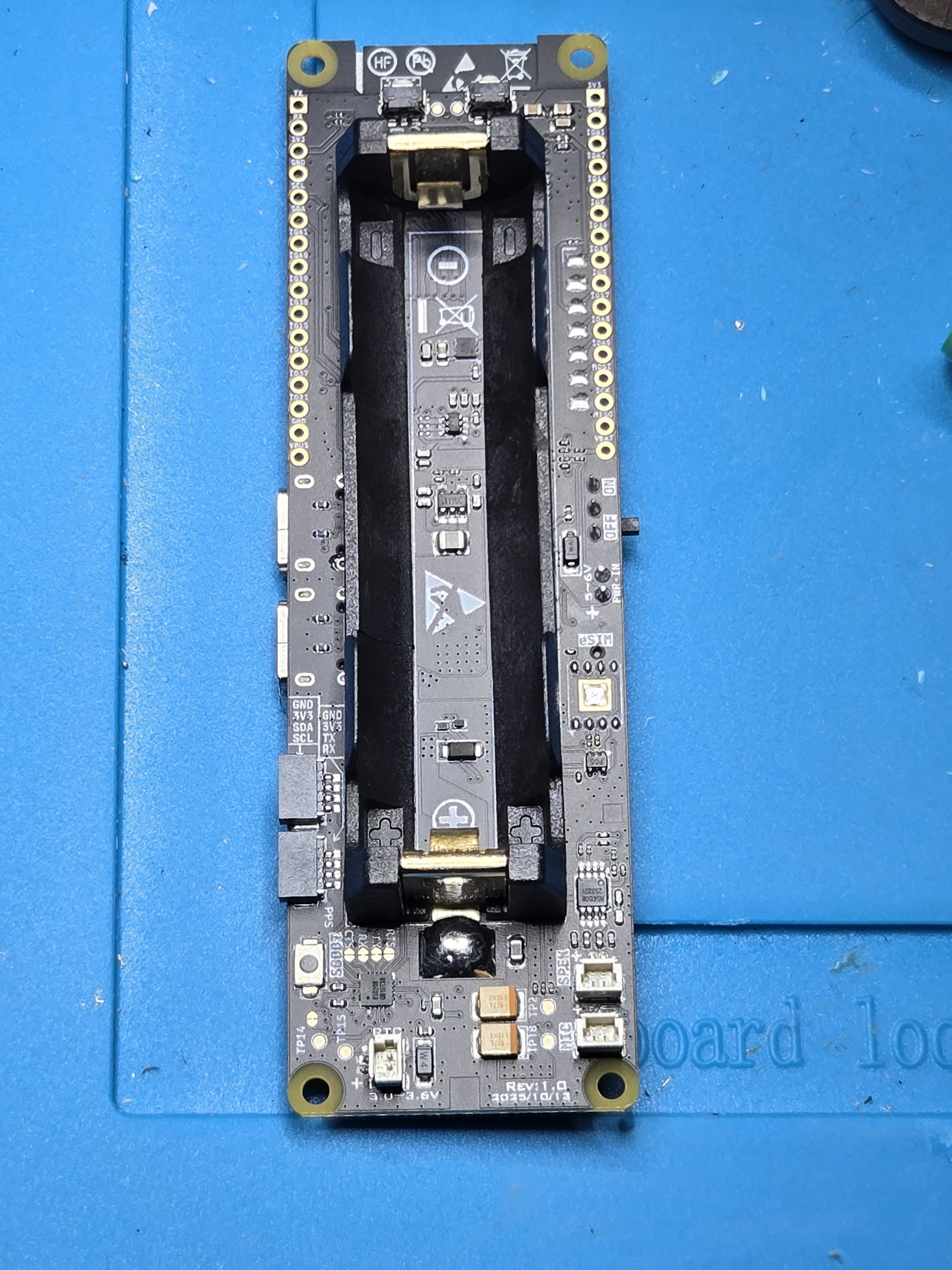 Factory 18650 holder and its two attachment joints before removal