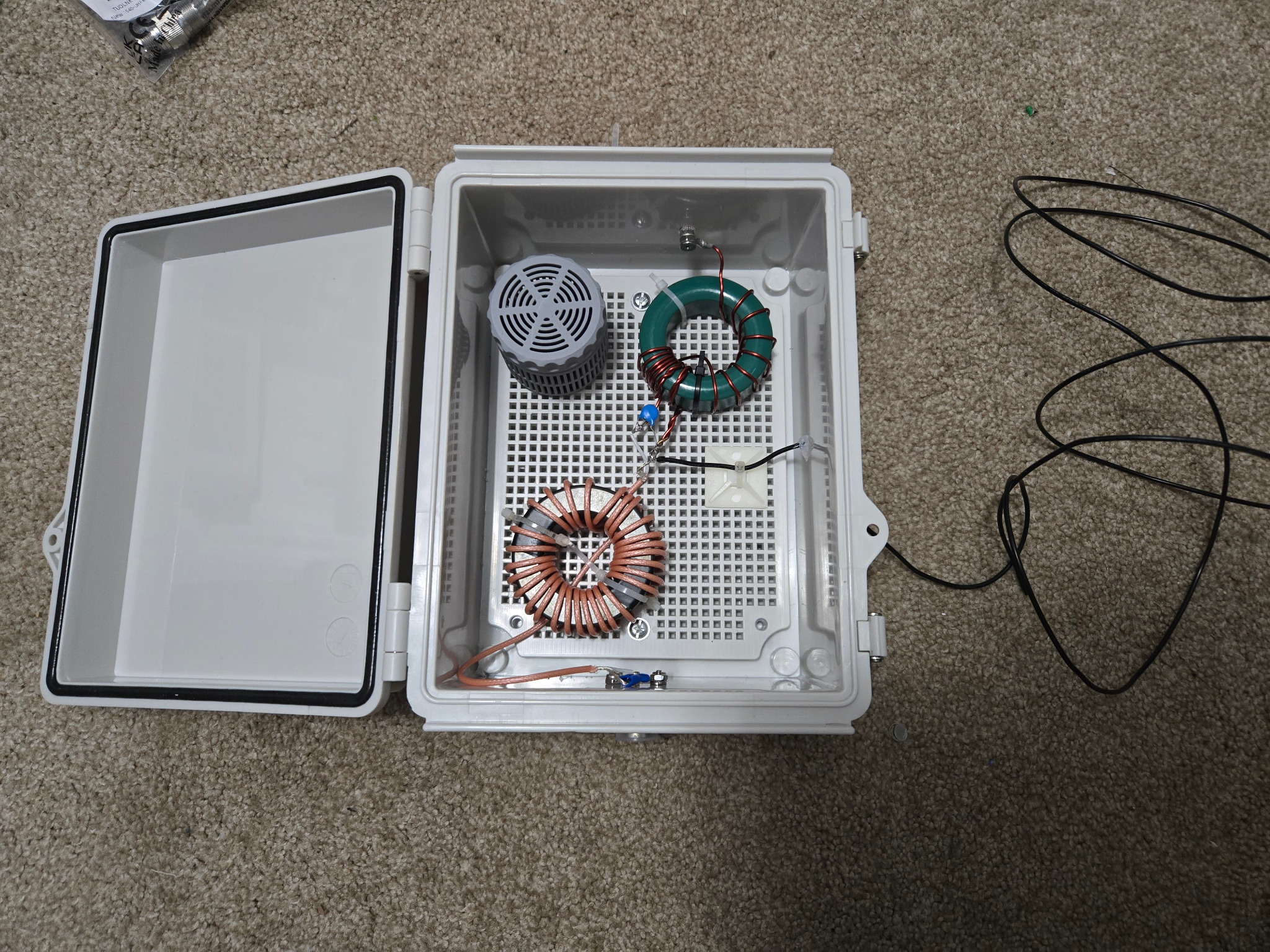 Home-built end-fed half-wave antenna matching unit in a weatherproof enclosure