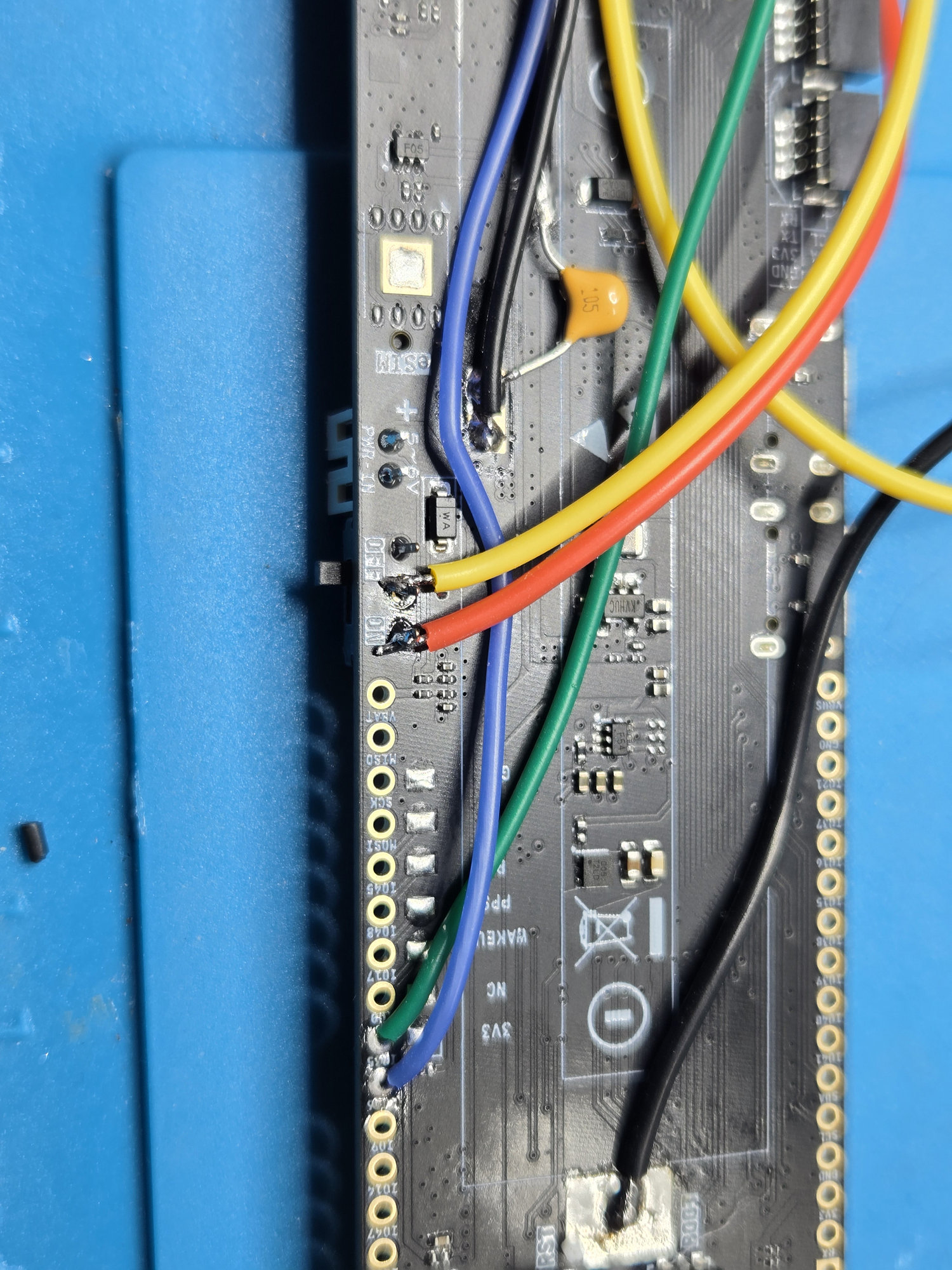 Close view of the power-switch taps and lower GPIO connections