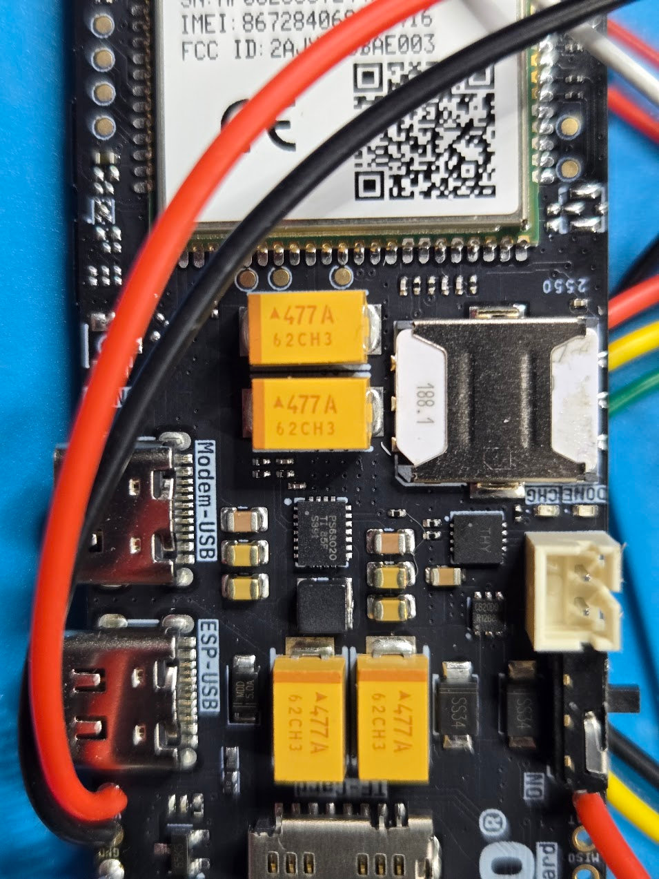 Activated nano-SIM fully seated in the LilyGO modem-side holder