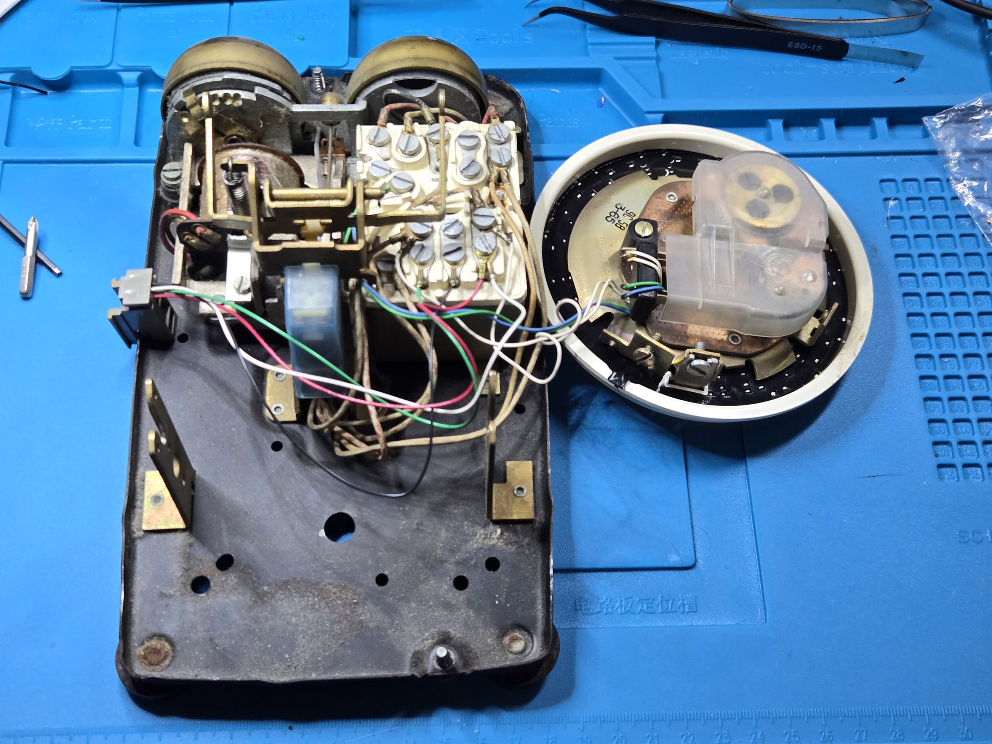 Dial assembly moved aside while its wiring remains connected
