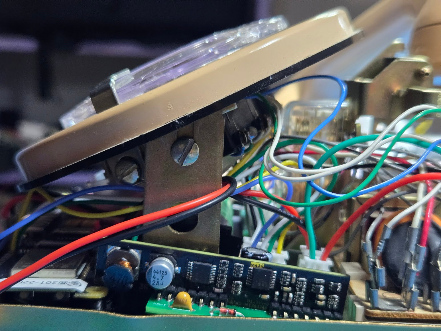 Close view from the opposite side showing the dial-retaining screws after installation