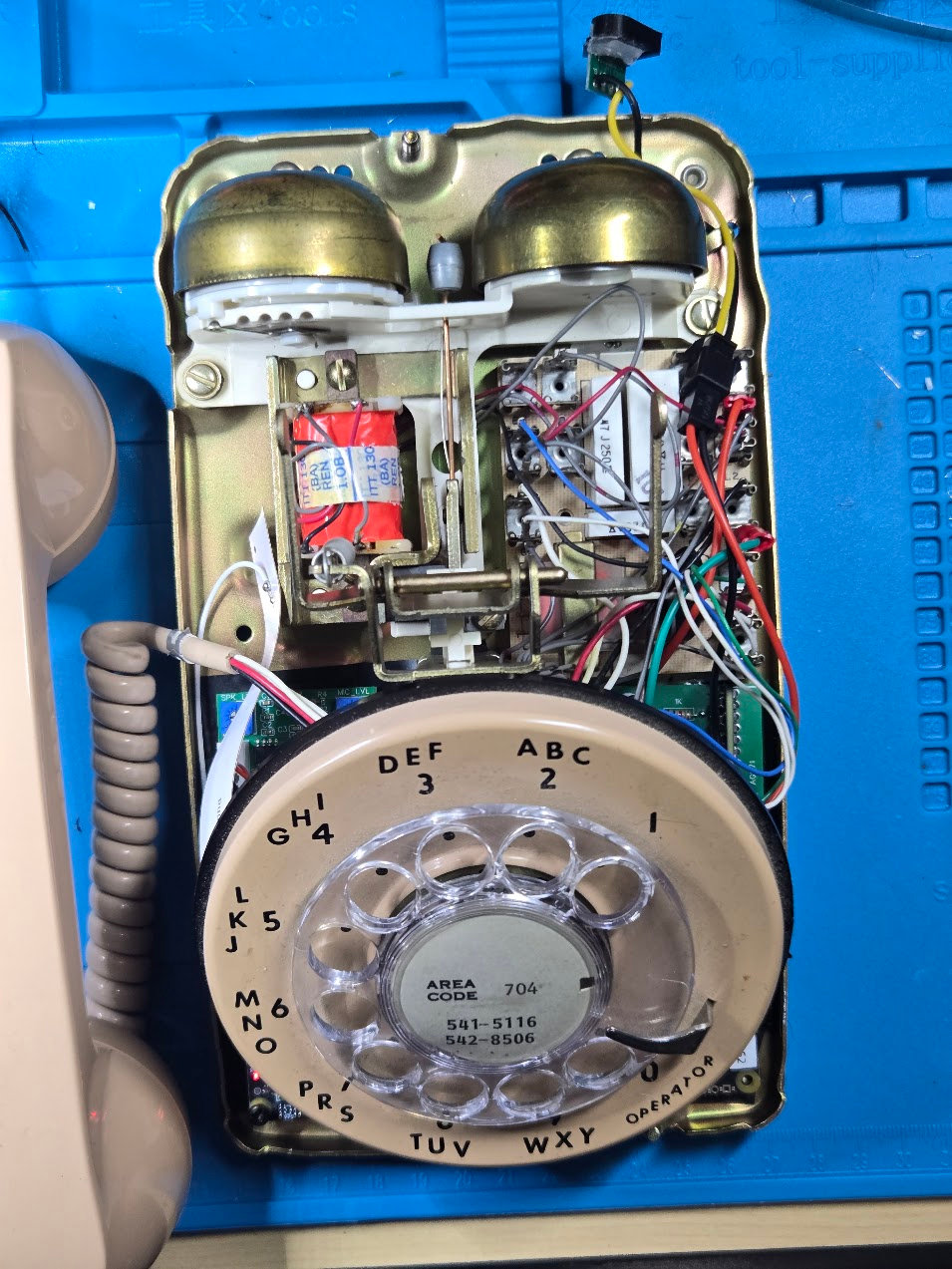 Overhead view of the completed RotaryCell installation and wire routing before the telephone shell is fitted
