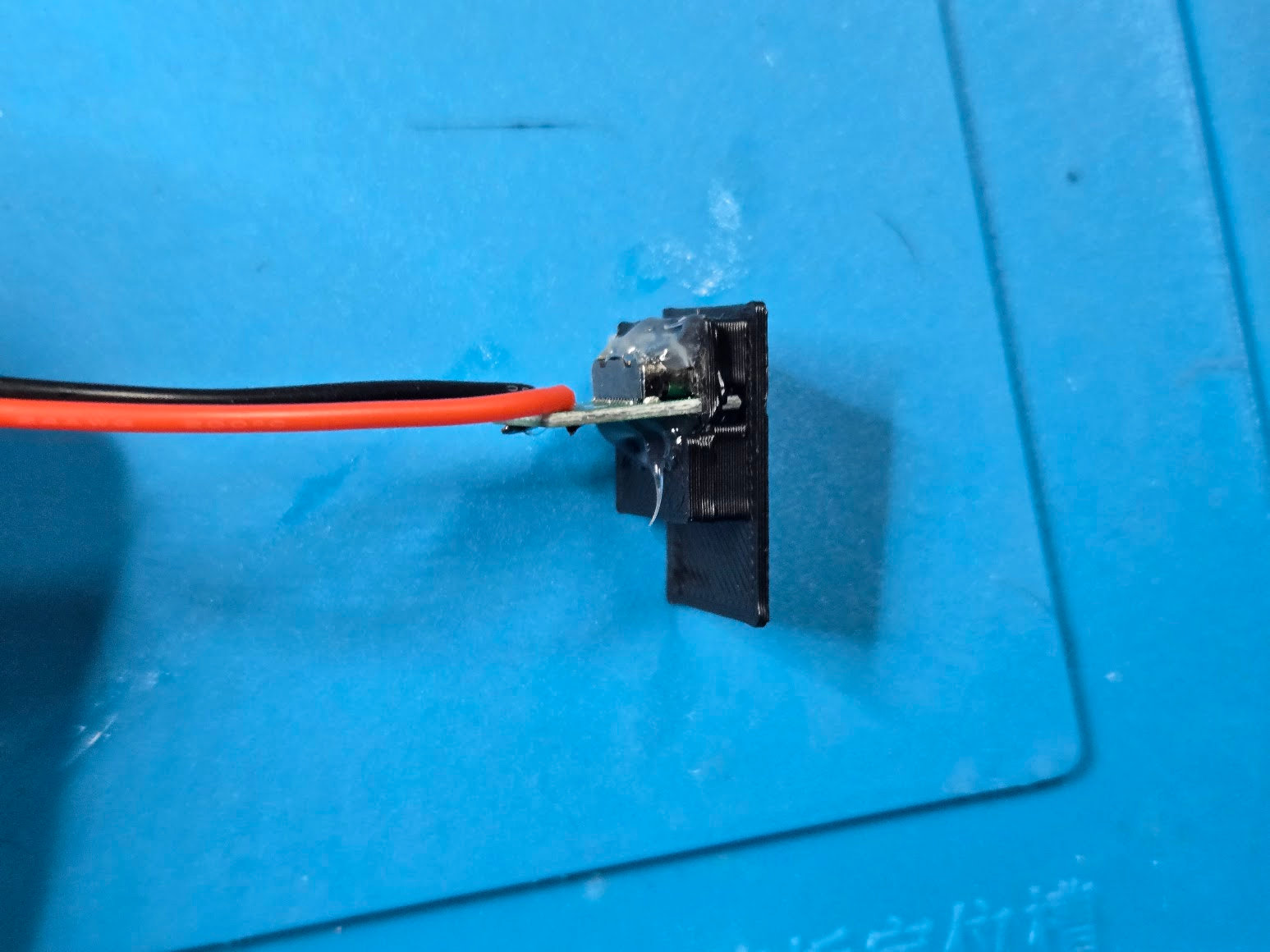 Rear view of the Rect R3 USB-C breakout showing adhesive around the board
